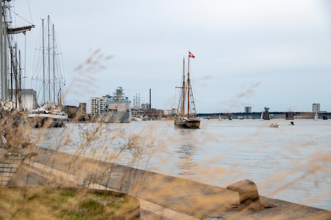 Quiet morning mist over a Danish harbor